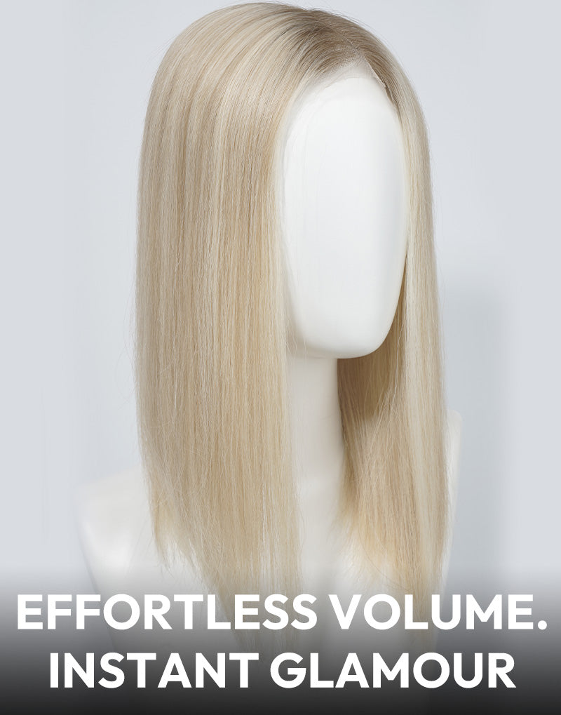 Blonde human hair topper displayed on a mannequin head.
