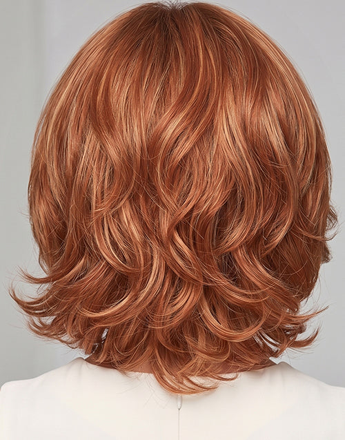 Direct back view of the Alma strawberry blonde highlighted short wavy bob wig.