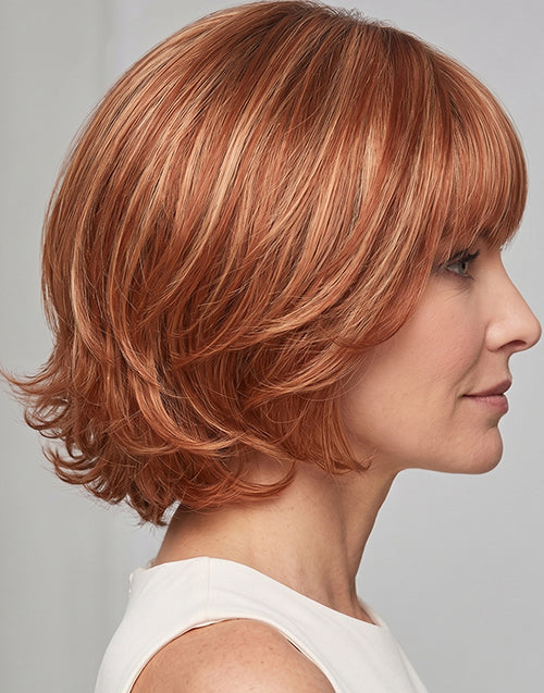 Right side profile view of the Alma strawberry blonde highlighted short wavy bob wig.