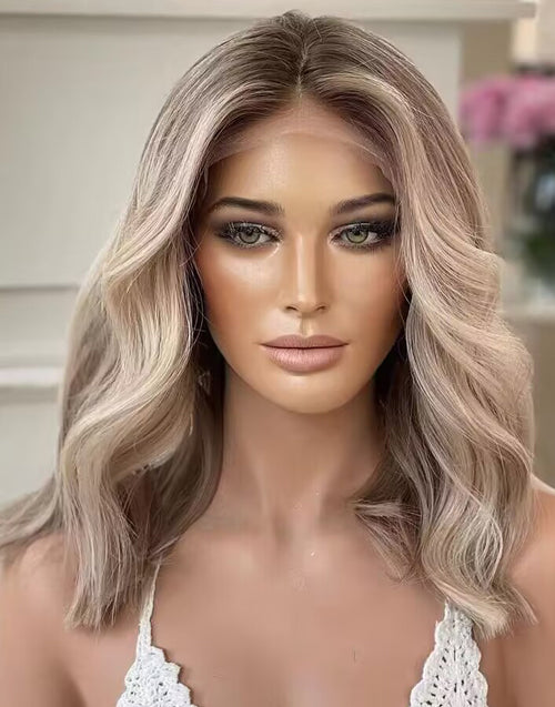 Ash blonde wavy short bob human hair wig with high-definition lace front hairline. 