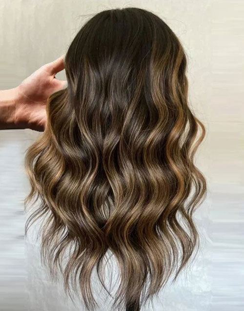 Back view of a long balayage brown body wave human hair wig, showing voluminous S-curl waves and seamless caramel highlights.