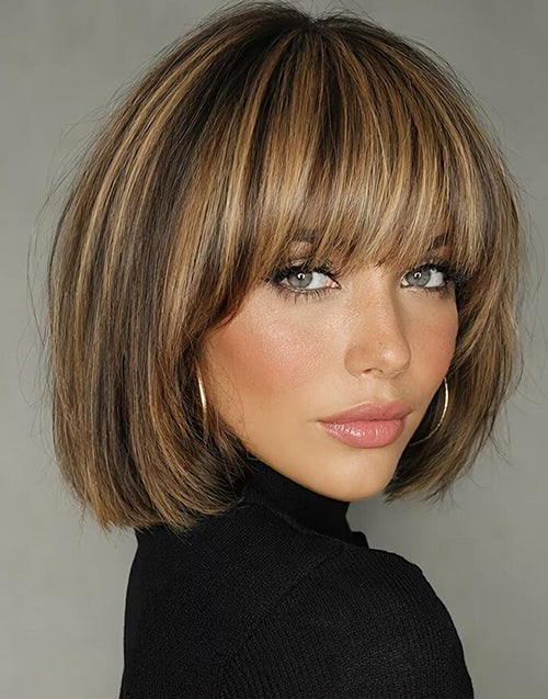 Model wearing the Berry balayage golden blonde short bob wig with wispy bangs, showing natural hairline and face-framing hair length.