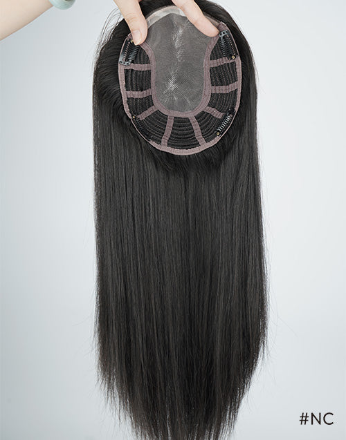 Inside view of a natural black straight human hair topper showing the breathable mesh base cap with secure clip-in fasteners.