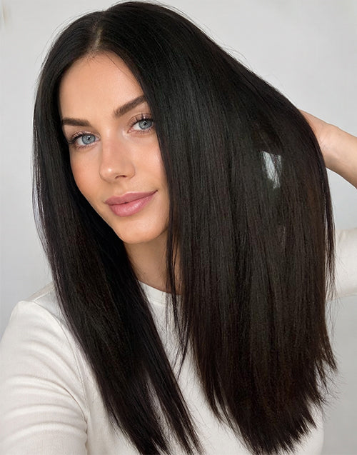 A woman with long, straight, black hair.