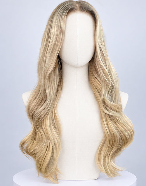 Front view of a long wavy blonde balayage lace front wig with dark root