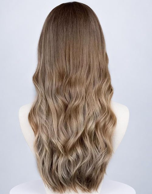 Back view of a long wavy blonde balayage human hair wig on a mannequin