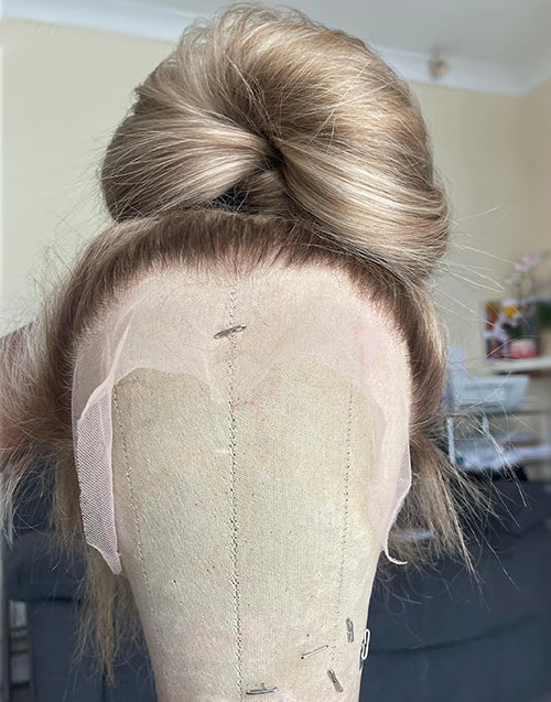Detailed view of the Cela 360 Lace Wig nape area on a mannequin.