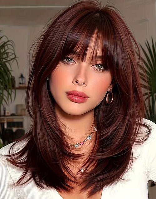 Front view of the Chris dark mahogany brown shoulder length layered wig, featuring soft wispy curtain bangs.
