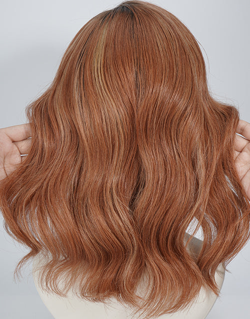 Back view of a shoulder-length wavy copper brown highlight wig.
