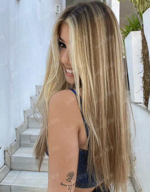 Side view of Hayley long straight strawberry blonde human hair wig featuring smooth hair texture and multi-tonal blonde highlights.