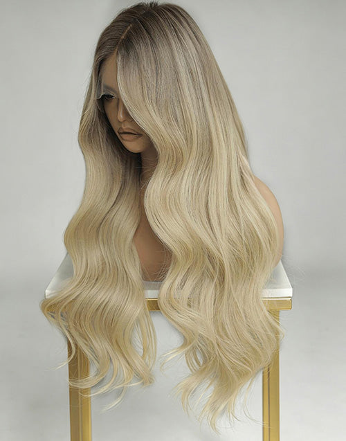 Long wavy wig with a blonde ombre color, displayed on a mannequin head.
