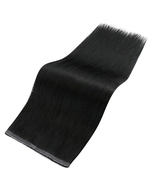 Natural black seamless flat human hair weft spread out showing the ultra-thin PU top track and smooth hair texture.