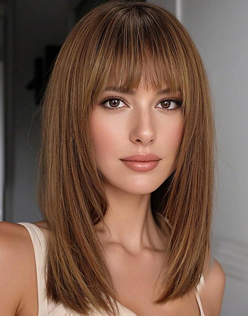 A model wearing a high-quality medium-length brown layered wig with natural bangs
