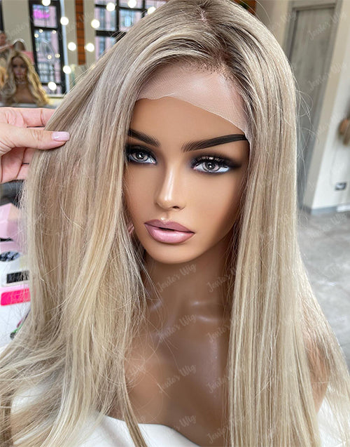 Front view of ombre ash blonde straight human hair wig with natural hairline.