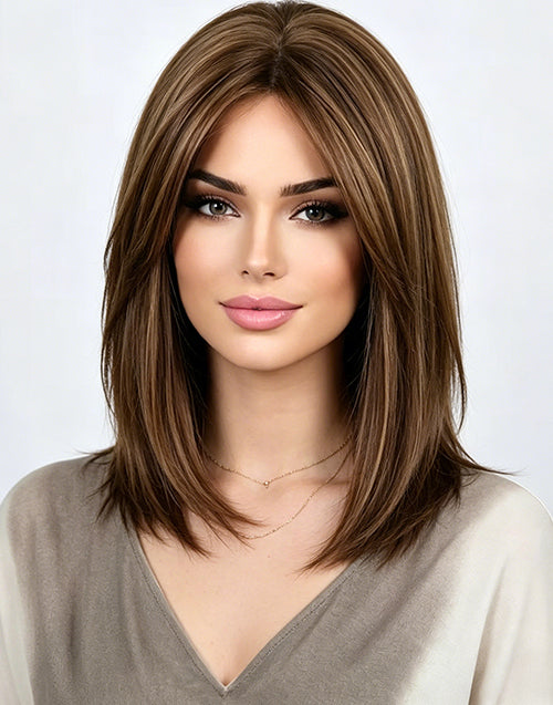 Front view headshot of the Paola Golden Brown Highlight Wig.