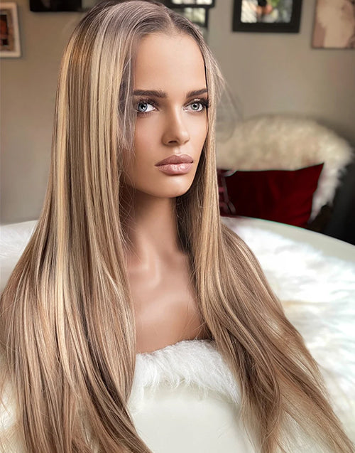 Front view of a warm blonde highlight wig with sleek straight hair.