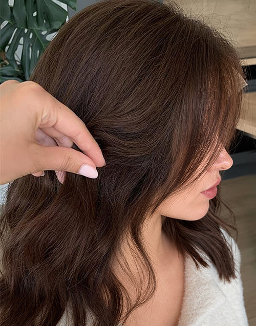 Detailed side view of Yushy medium chestnut brown 13x4 lace wig