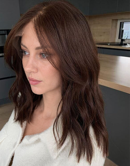 Three-quarter front view of Yushy medium chestnut brown 13x4 lace front wig