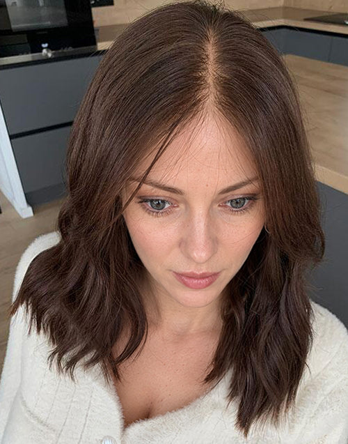 Top-down view of Yushy medium chestnut brown 13x4 lace wig showing realistic hand-tied scalp parting and natural hair growth line.